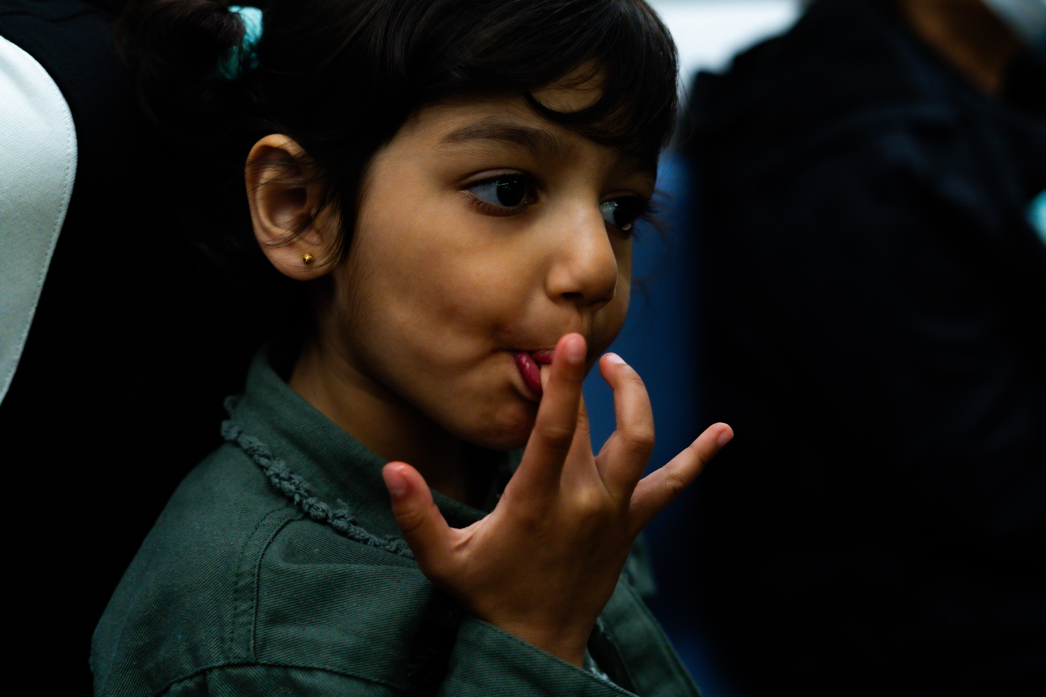 Girl Licking Her Finger